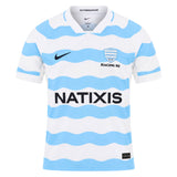 White short-sleeved Racing 92 26/27 Stadium Home Jersey by Nike featuring light blue wavy horizontal stripes, sponsor logos, and team branding on the chest.