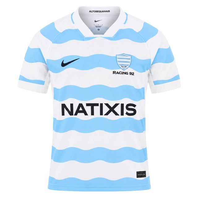 White short-sleeved Racing 92 26/27 Stadium Home Jersey by Nike featuring light blue wavy horizontal stripes, sponsor logos, and team branding on the chest.