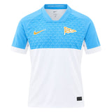 Aviron Bayonnais 26/27 Stadium Home Jersey by Nike in light blue and white, featuring a gold Nike swoosh and a gold pennant flag emblem with the letters AB.