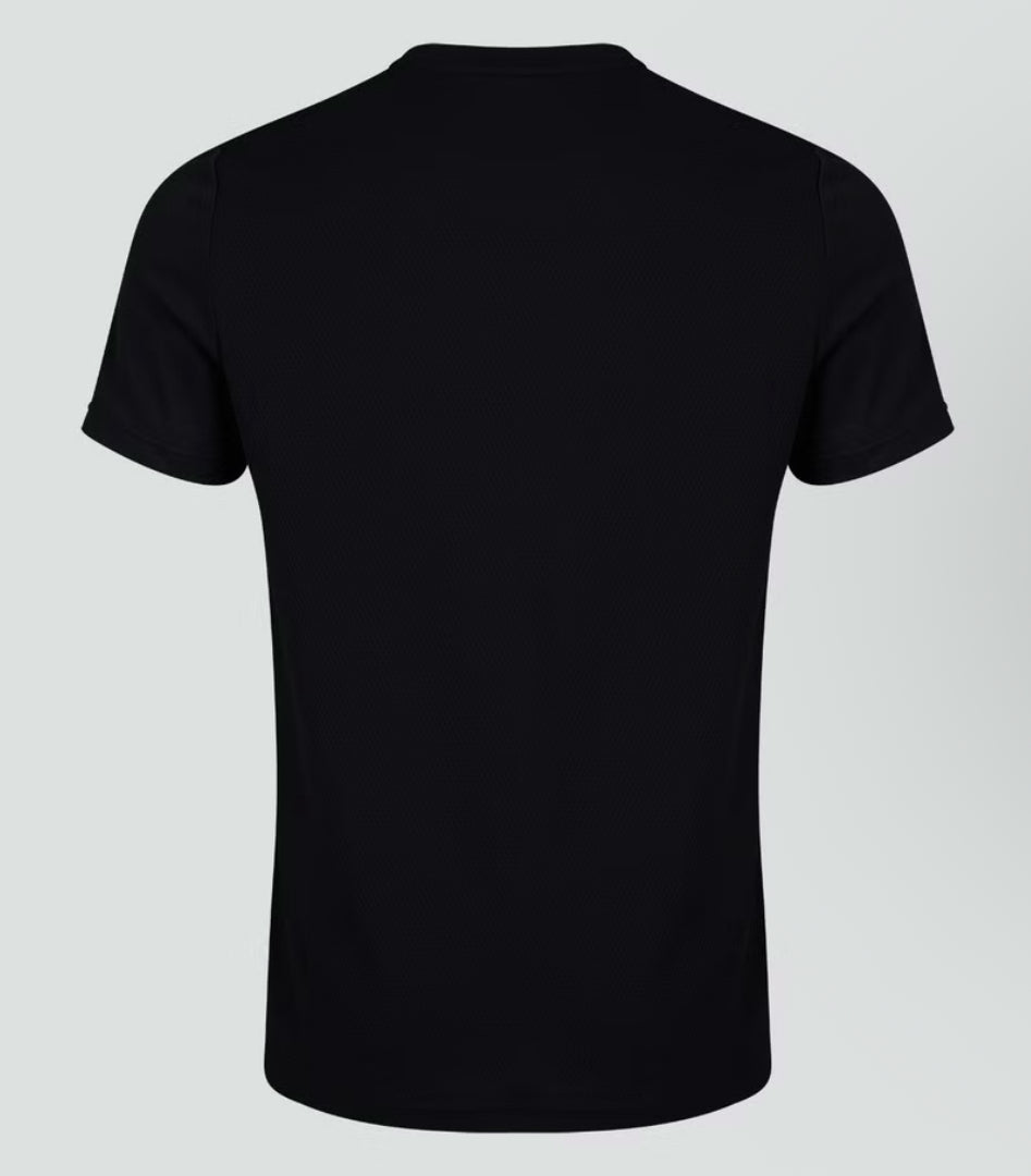 The Canterbury Club Dry Tee by Canterbury is displayed from the back against a light gray background, showcasing its simple design and breathable workout features.