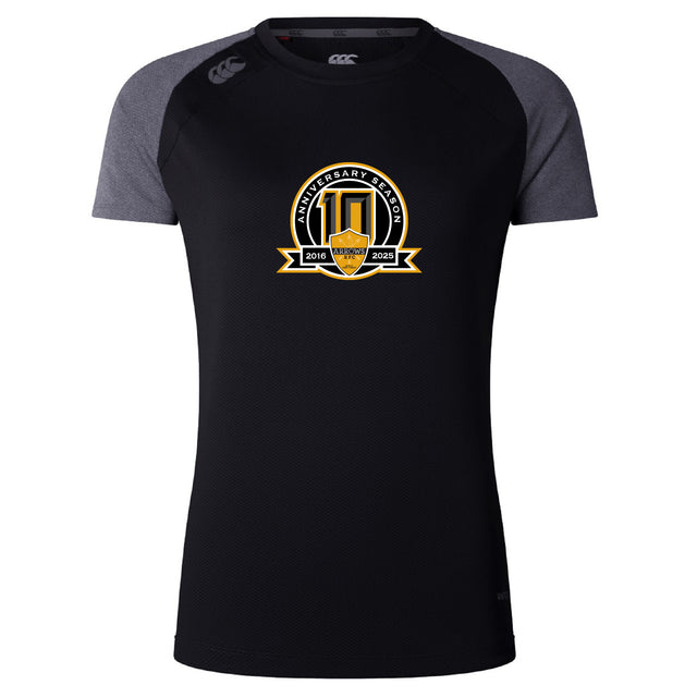 The Arrows Rugby Club 10th Anniversary Women's Elite Training Tee by WRS Canterbury features black and grey recycled polyester, a chest shield, and "10th Anniversary Season 2016–2026" logo.