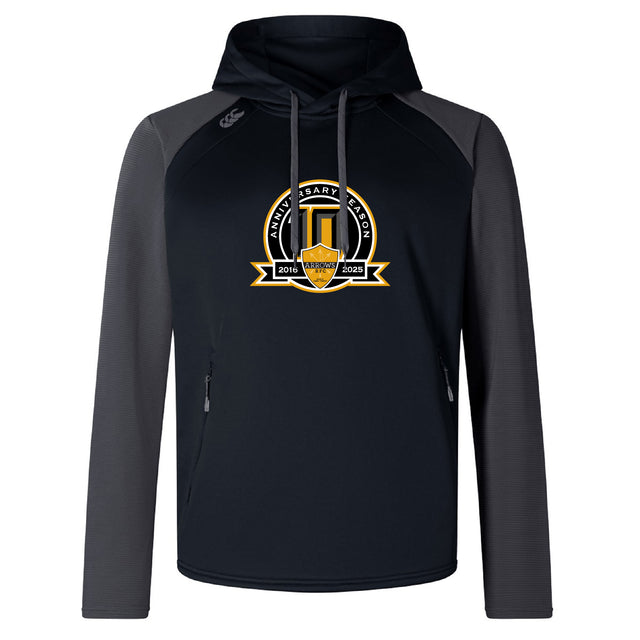 The Arrows Rugby Club 10th Anniversary Elite Training Hoody by WRS Canterbury features black and dark gray colors, a zippered pocket, and a gold/white "Anniversary Season 2016-2022" logo—ideal custom sportswear for any occasion.