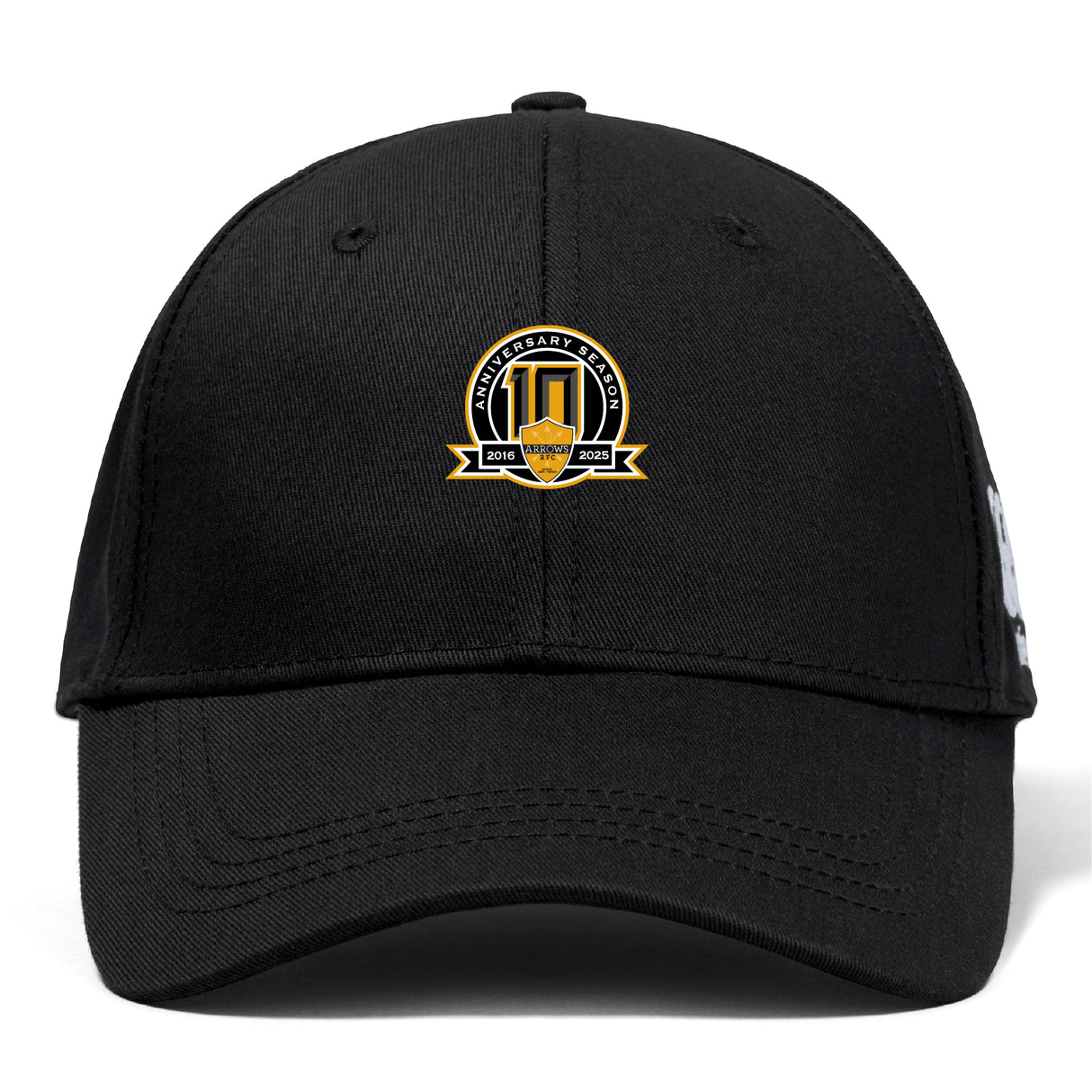 The Arrows Rugby Club 10th Anniversary Flexfit Drill Cap by EMB Canterbury features a gold, white, and black "10th Anniversary Season 2014-2023" embroidered logo on the front.