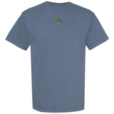 The Argentina Vintage Comfort Tee by EMB S&S Activewear is a plain blue heavyweight tee with a small yellow and black tiger graphic and "OFF" text centered on the chest.
