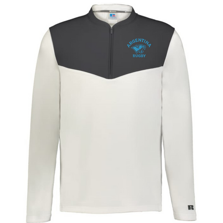 The EMB Augusta Nations of Rugby Argentina Sideline Grid 1/4 Zip Pullover features long sleeves, a half-zip design, dark gray upper with cream lower sections, and an "Argentina Rugby" logo on the left chest.
