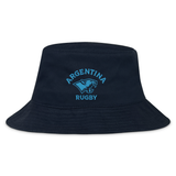 Show your support with the Nations of Rugby Argentina Rugby Crusher Bucket Hat by EMB S&S Activewear, featuring a blue puma logo and "Argentina Rugby" embroidered on a navy blue cotton twill design.