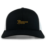 The EMB S&S Activewear Arrows Rugby Club Retro Trucker Cap features a black and white design, yellow "Arrows Rugby" logo with crossed arrows on the front, and an adjustable snapback closure for a custom fit.
