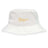 The Arrows Rugby Club Crusher Bucket Cap by EMB S&S Activewear is a white cotton twill hat with "Arrows Rugby" and a yellow three-crossed-arrows logo on the front, providing excellent sun protection for fans.