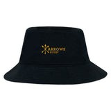 The EMB S&S Activewear Arrows Rugby Club Crusher Bucket Cap is a black cotton twill hat featuring a yellow "Arrows Rugby" logo with crossed arrows, combining classic style and sun protection in a sporty design.