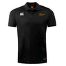 The Arrows Rugby Club Club Dry Polo by EMB Canterbury is a black short-sleeve polo with a collar, featuring white Canterbury and gold Arrows Rugby chest logos. Made with Vapodri Technology for breathability and comfort.