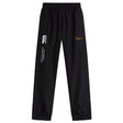 The Arrows Rugby Club Cuffed Hem Stadium Pant by EMB Canterbury features black fabric, an elastic waistband, white "Canterbury of New Zealand" text and logo on one leg, a yellow Xamax logo on the other, and comfortable cuffed hems.