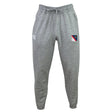 The American University Leisure Sweatpants by EMB Canterbury are gray, made from recycled polyester fleece, and feature a drawstring waist, a small logo on the left thigh, and a patch on the right thigh.
