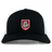 The AG Bulldogs Retro Trucker Cap by EMB S&S Activewear features a black and white design, embroidered bulldog logo with "1920" on a red shield, and an adjustable snapback closure.