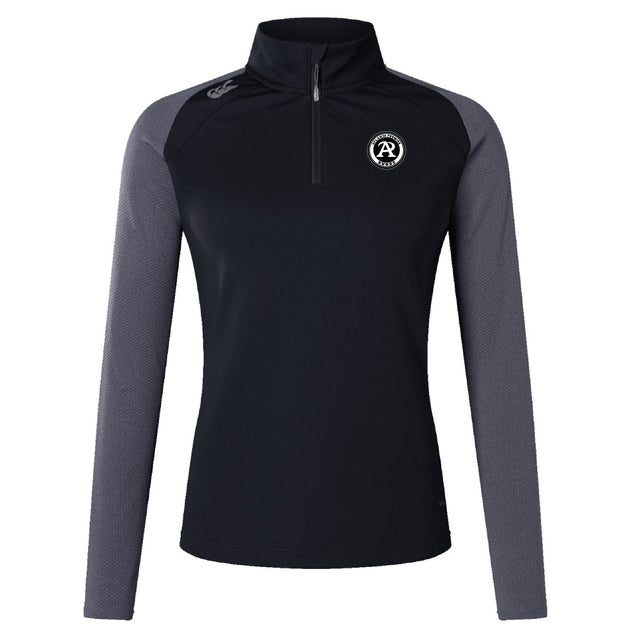 The EMB Canterbury Atlanta Premier Rugby Club Women's Elite First Layer is a black and grey long-sleeve pullover with VapoDri tech, quarter-zip front, and dual chest and shoulder logos for advanced moisture wicking.