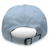 The Fiji Throwback Cotton Twill Dad Cap by EMB S&S Activewear is shown from the back in light blue, featuring an adjustable strap with a metal buckle and two stitched eyelets for a classic look.