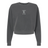 The EMB S&S Activewear Women's Amoskeag Rugby Club Mid-Length Crewneck Sweatshirt is a dark gray, relaxed-fit top with "AMOSKEAG Est. 1984" and a small white graphic on the chest, inspired by classic rugby club styles.