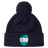 The EMB Canterbury Argentina Shield Pom Pom Beanie in navy blue features a fun patch with a sun-centered flag, adding flair to your winter wardrobe.