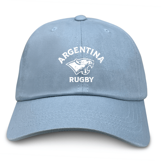 The EMB S&S Activewear Nations of Rugby Argentina Dad Cap features a light blue color with "Argentina Rugby" and a white jaguar logo embroidered on the front.