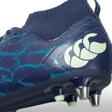 A close up of a blue and green rugby boot with exceptional traction, the Canterbury Stampede Pro SG - Medieval Blue/Blue Sapphire.