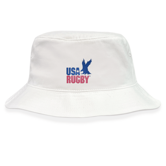 Stay stylish with the EMB S&S Activewear USA Rugby Throwback Crusher Bucket Hat, made from cotton twill for comfort and sun protection. Features a blue eagle graphic and bold blue and red "USA RUGBY" text on the front.