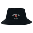 The Nations of Rugby England Rugby Crusher Bucket Hat by EMB S&S Activewear is a black cotton twill hat with "England Rugby" and a red rose logo embroidered on the front.