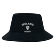 The EMB S&S Activewear Nations of Rugby Ireland Rugby Crusher Bucket Hat is made from soft cotton twill, featuring "Ireland Rugby" and a white shamrock crest embroidered on the front.