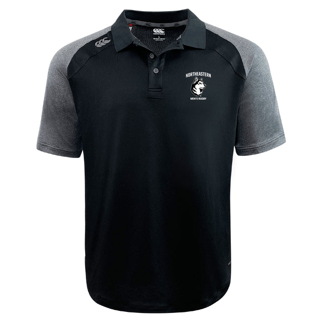The Northeastern University Men's Rugby Elite Polo by EMB Canterbury features black and grey short sleeves, "Northeastern Men's Rugby" chest logo, Canterbury logos on shoulder and collar, and lightweight Vapodri fabric for comfort.