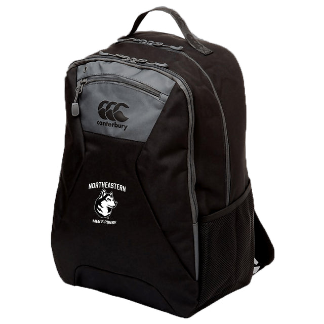 The EMB Canterbury Northeastern University Men's Rugby Medium Backpack is black with gray accents, has a white team logo, mesh side pocket, and a padded laptop compartment for protection.