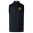 Black sleeveless padded vest with insulated baffles, featuring a high collar and front zipper. The EMB Canterbury logo showcases a green dinosaur with "Binance" text in yellow above red stripes. Perfect for an Elite Gilet experience with the Baltimore Chesapeake Brumbies Women's Elite Microlite Gilet by Canterbury.