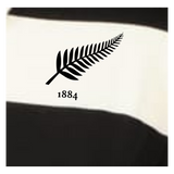 The EMB Augusta Women's Vintage New Zealand Prep Street Rugby Crop features black and white stripes with a bold black fern and "1884" graphic, inspired by classic New Zealand rugby shirts.