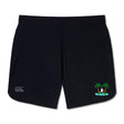 The Twin Island Rugby Women's Elite Woven Short by EMB Canterbury features black fabric, a white left-leg logo, a tropical right-leg design with palm tree and surfer, plus zippered pockets for secure storage.