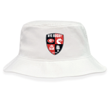 The EMB S&S Activewear Rye High School Rugby Crusher Bucket Cap is a white cotton twill hat with a "Rye Rugby" crest patch in red, black, and white—featuring rugby ball, dragon, and lion symbols for stylish sun protection.