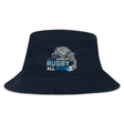 The NC All Stars Crusher Bucket Cap by EMB S&S Activewear is a navy blue cotton twill hat with a "North Carolina Rugby All Stars" logo and rhinoceros graphic, offering stylish sun protection.