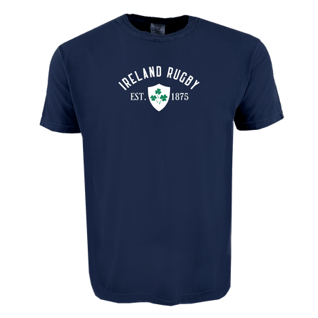 The WRS Alpha Broder Ireland Rugby Est 1875 Heavy Comfort Tee is navy blue with “Ireland Rugby Est. 1875” and a white shield featuring a green shamrock printed on the front.
