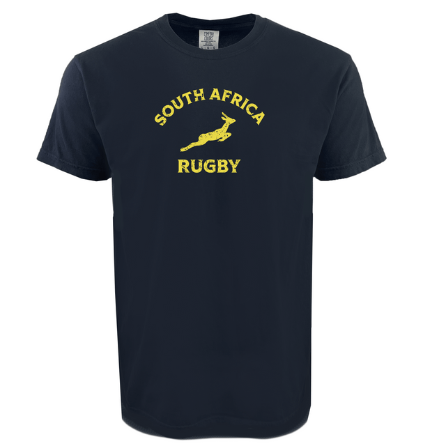 The WRS Alpha Broder Nations of Rugby South Africa Heavy Comfort Tee is a navy blue shirt featuring "SOUTH AFRICA RUGBY" and a bold yellow springbok graphic on the front.
