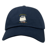 The Cal Maritime Rugby Adult Low-Profile Cotton Twill Dad Cap by EMB S&S Activewear features navy blue cotton twill, an embroidered white sailing ship, "Cal Maritime R.I.F.C." text, and 1927 & 1998 above a red banner.