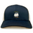 The EMB S&S Activewear Cal Maritime Rugby Retro Trucker Cap is a navy blue and white cap with an embroidered sailing ship and “Coldharbour R.F.L.C. 1927 S/V Tradewind 1998” on the front, finished with a classic snapback closure.