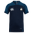 The Cal Maritime Rugby Vapodri Evader Jersey by EMB Canterbury is a navy blue and teal short-sleeve top with a white "Canterbury" logo, ship emblem on the left chest, and moisture-wicking technology for comfort during play.