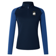 The Cal Maritime Rugby Women's Elite First Layer by EMB Canterbury is a navy and blue long-sleeve athletic top with a quarter-zip front, VapoDri moisture-wicking tech, and an embroidered ship logo on the chest. Inspired by Canterbury's elite design.