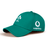 The Ireland 24 Drill Cap by Canterbury is a green cap featuring the IRFU logo on the front and the Vodafone logo on the side. Crafted from 100% cotton, it includes an adjustable strap for a perfect fit.