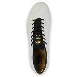 The Canterbury Stampede Groundbreak Elite SG - White rugby boot by Canterbury features black laces, a black tongue, and a gold logo on the insole—perfect for power forwards. Shown from a top-down view.