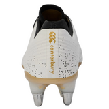 The Canterbury Stampede Groundbreak Elite SG rugby boot in white features black details, metal studs, and gold Canterbury branding on the heel—perfect soft ground boots for power forwards.
