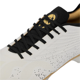 Close-up of the Canterbury Stampede Groundbreak Elite SG rugby boot by Canterbury in white, featuring black laces, a textured upper, and a gold and black logo on the tongue.