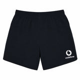 Women’s Ireland 26 6″ Woven Gym Short by Canterbury, shown from the back. Featuring an elastic waistband and inspired by classic Canterbury rugby shorts, these versatile black athletic shorts are ideal for women’s workouts or as Ireland gym shorts. The Vodafone logo is printed in white on the lower right leg.