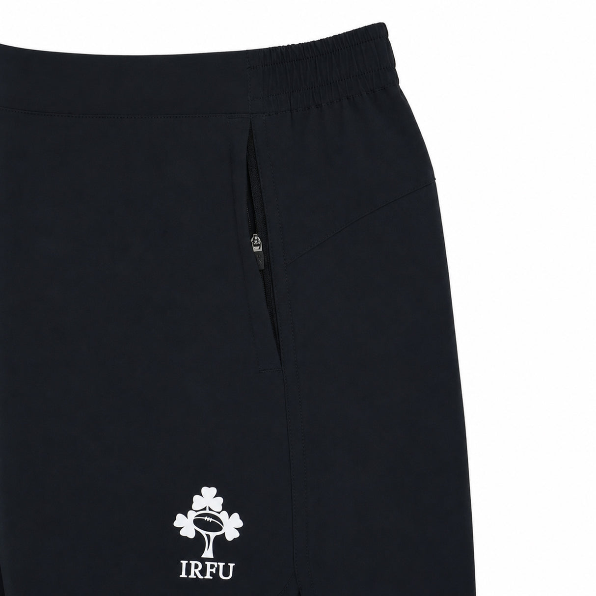 Close-up of the Canterbury Women’s Ireland 26 6″ Woven Gym Short in black, featuring a zippered pocket and the IRFU shamrock logo, inspired by classic Ireland Rugby shorts.