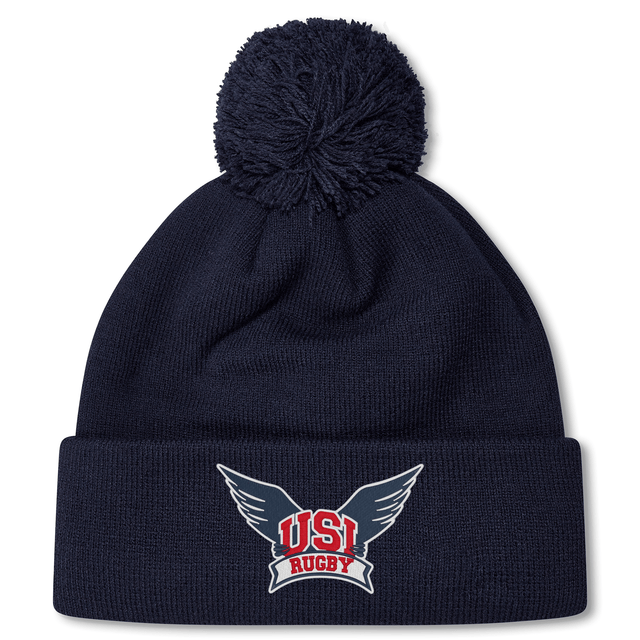 A navy blue University of Southern Indiana Pom Pom Beanie by Canterbury with an embroidered "USI Rugby" logo featuring wings on the folded brim. This fleece-lined bobble hat by EMB Canterbury is the perfect pitch-side companion.