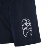The Canterbury Women's Tactic Short is a navy blue athletic short with a white abstract triple-leaf logo on the left thigh.