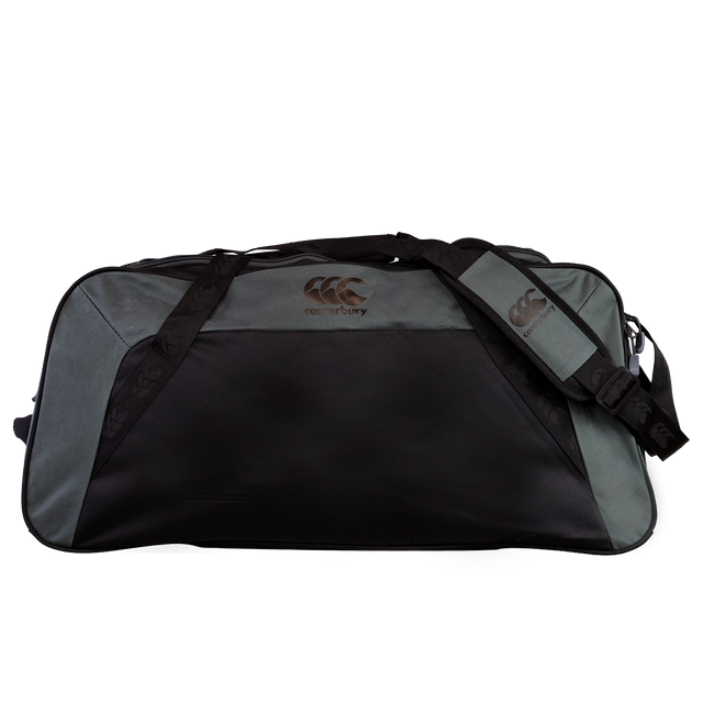 The Canterbury Holdall Duffle Bag by Canterbury in black and gray features a logo on the front and strap, includes a shoulder strap, and is water-repellent—ideal for carrying your rugby essentials while protecting your gear.
