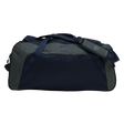 The Canterbury Holdall Duffle Bag by Canterbury, shown in dark blue and gray with a shoulder strap, features a water-repellent finish to protect your rugby essentials. Photographed against a plain white background.
