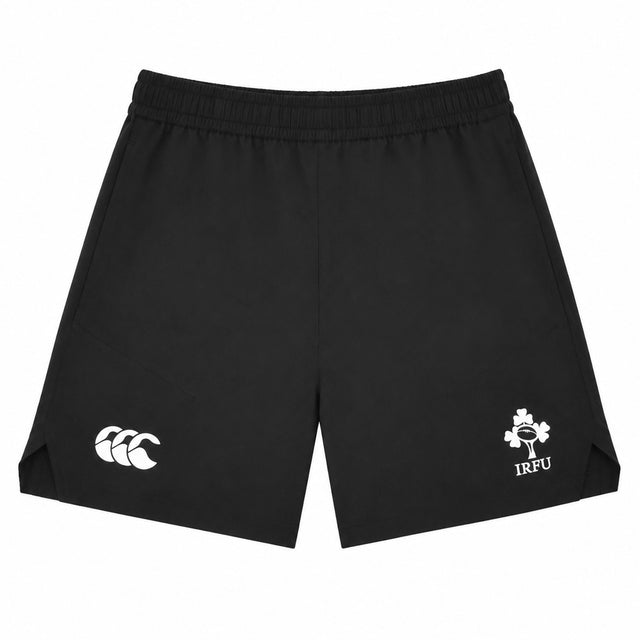 The Ireland 26 5″ Woven Gym Short by Canterbury features a black design with an elastic waistband, accented by a white Canterbury (CCC) logo on the left leg and the IRFU crest on the right leg. Displayed against a white background, these gym shorts offer a comfortable fit with their 5-inch inseam, making them ideal for training sessions or everyday wear.